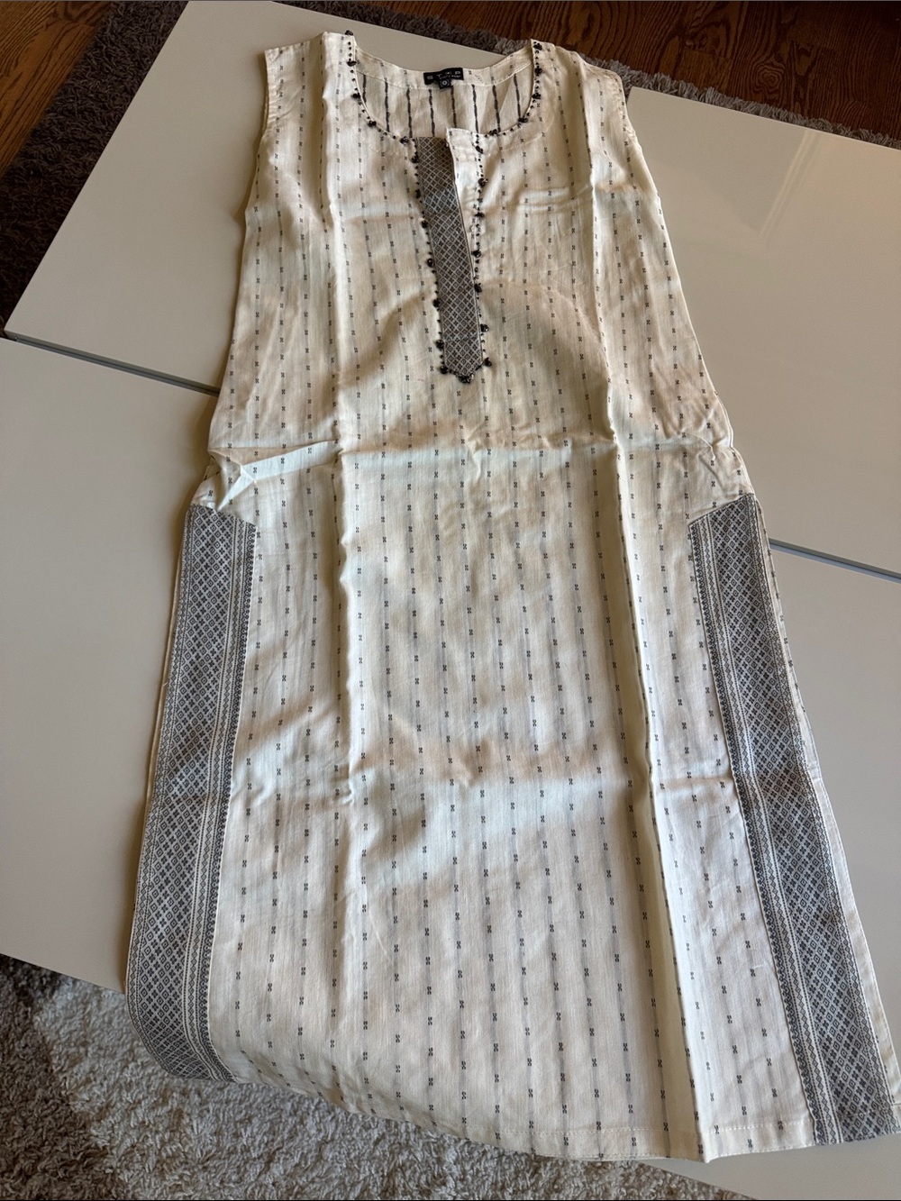 Sleeveless Cream Cotton Ethnic Kurta with Gray Trim ( Final Sale)